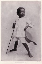 Vintage photo of child playing hero