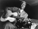 Leadbelly playing 12 string guitar