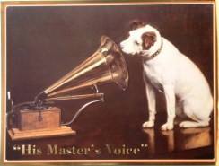 vintage photo of Victrola with listening dog
