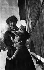 Photo of the poet Edith Sodergran holding her cat...